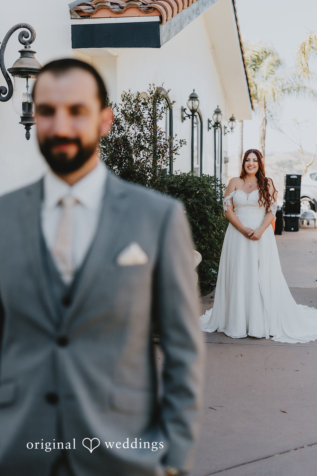 Lovely picture of bride and groom captured by team of Original Weddings