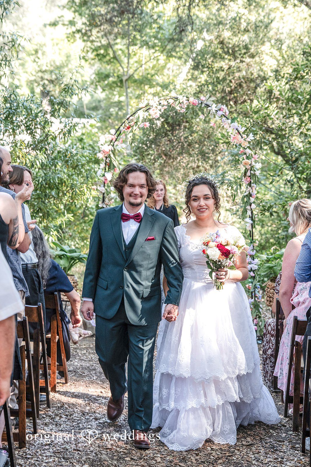 Keely + Sam Bride and groom leaving the altar happily, walking hands in hands
