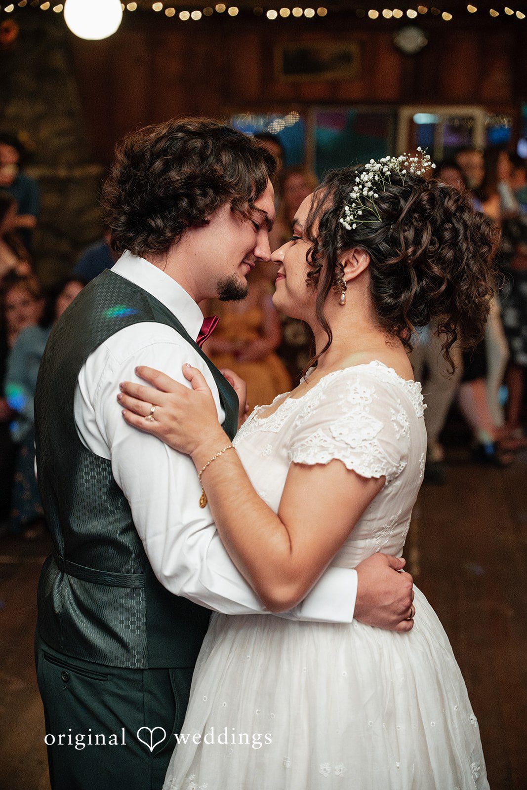 Keely + Sam A candid shot of couple at Camp Bartlett wedding