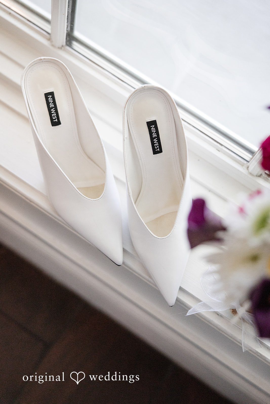 Kellie + AJ Elegant bridal shoes displayed before the ceremony