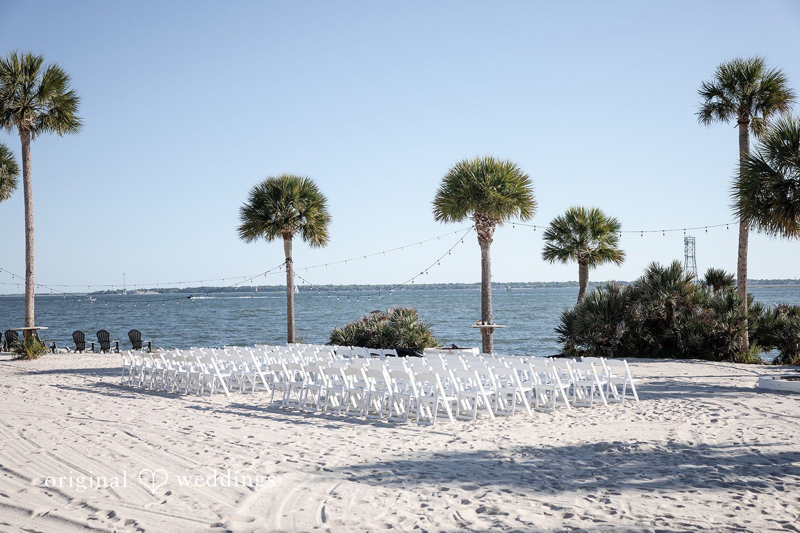 Kellie + AJ Empty beachfront ceremony setup overlooking the water