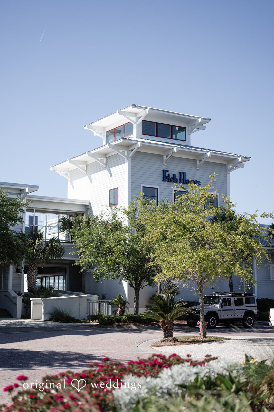 Kellie + AJ Exterior view of Charleston Harbor Resort and Marina by the waterfront