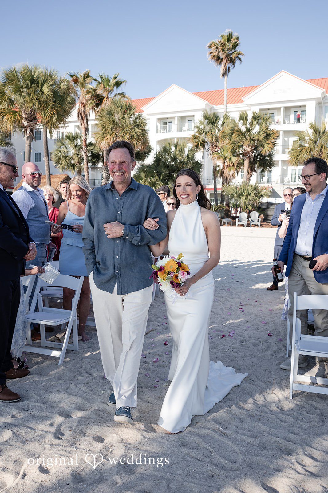 Kellie + AJ Bride walking down the aisle with her father