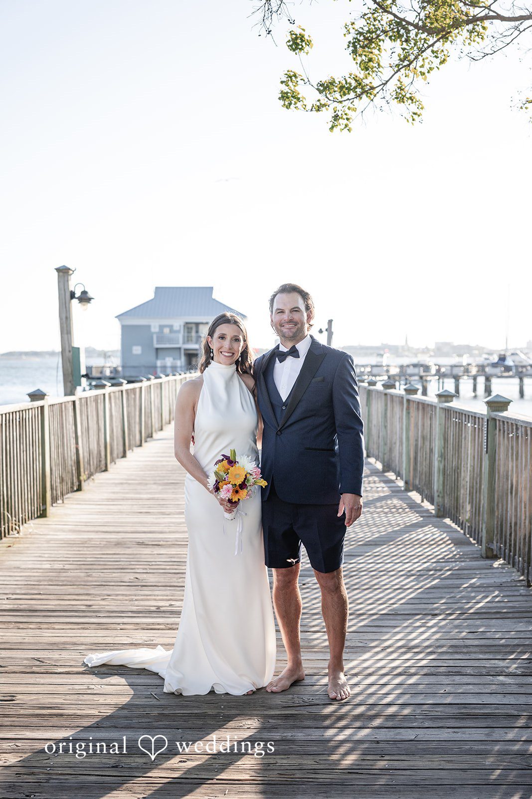 Kellie + AJ Full-length portrait of the couple on the marina dock
