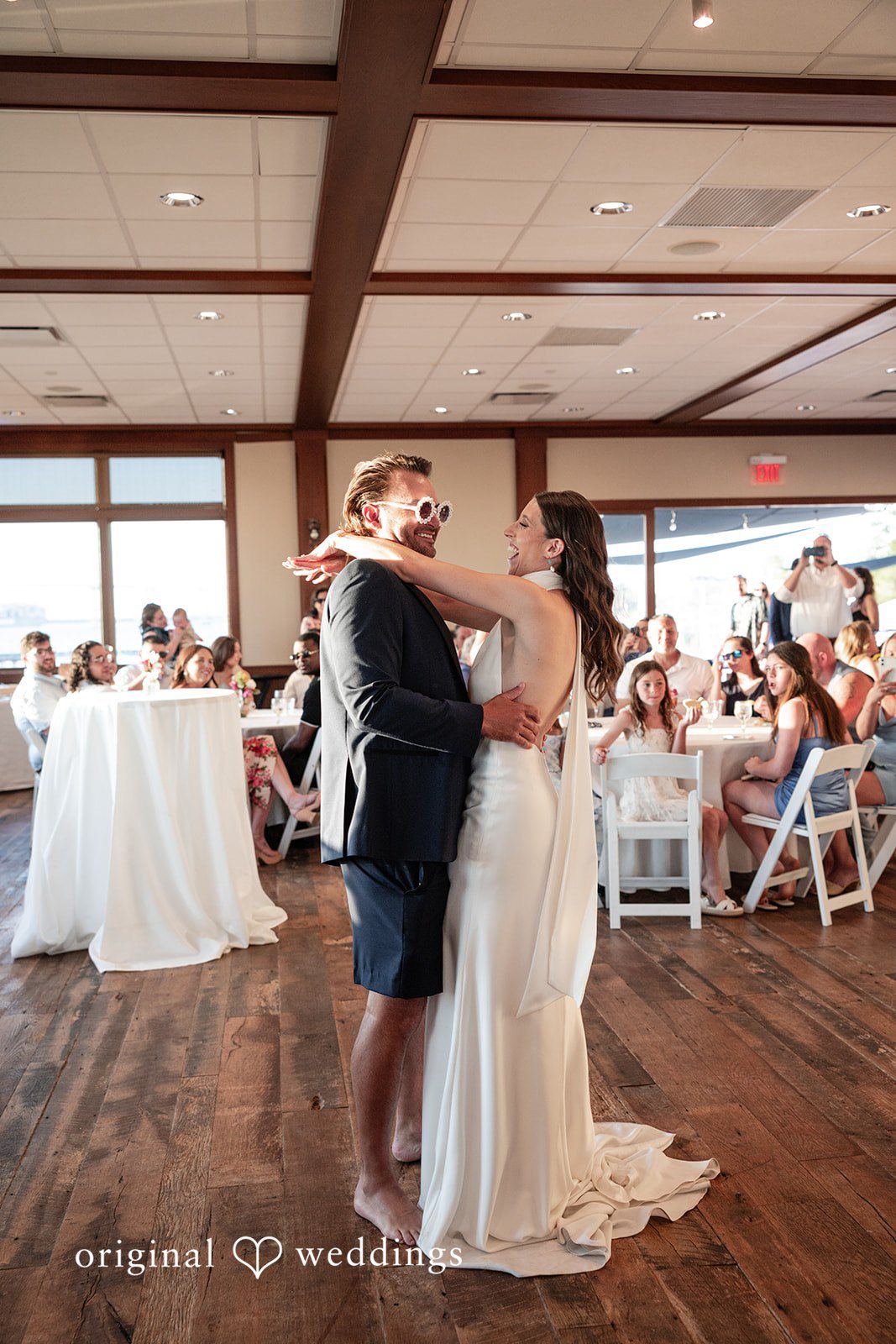 Kellie + AJ Bride and groom sharing their first dance at the reception