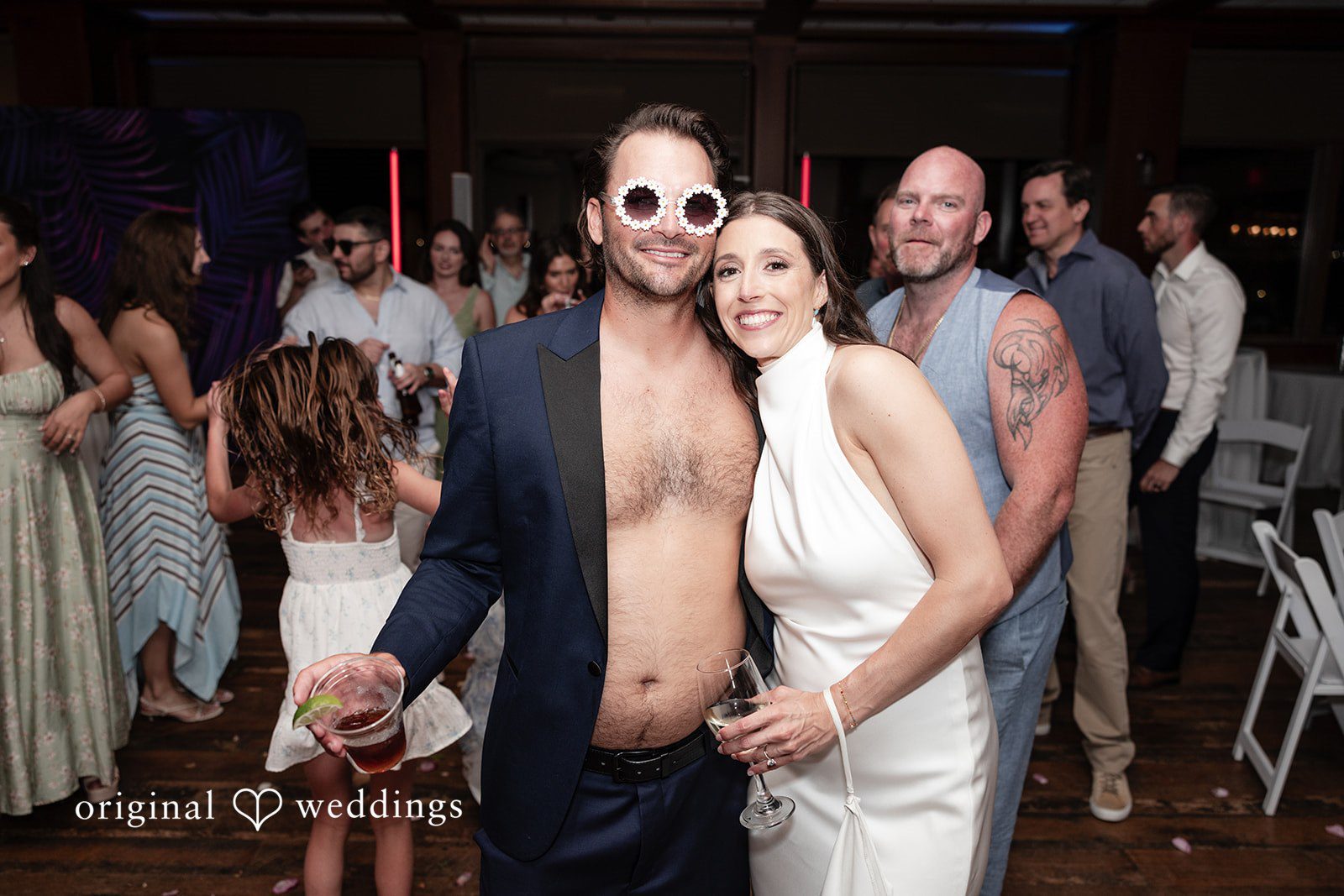 Kellie + AJ Bride and groom enjoying fun moments on the reception dance floor