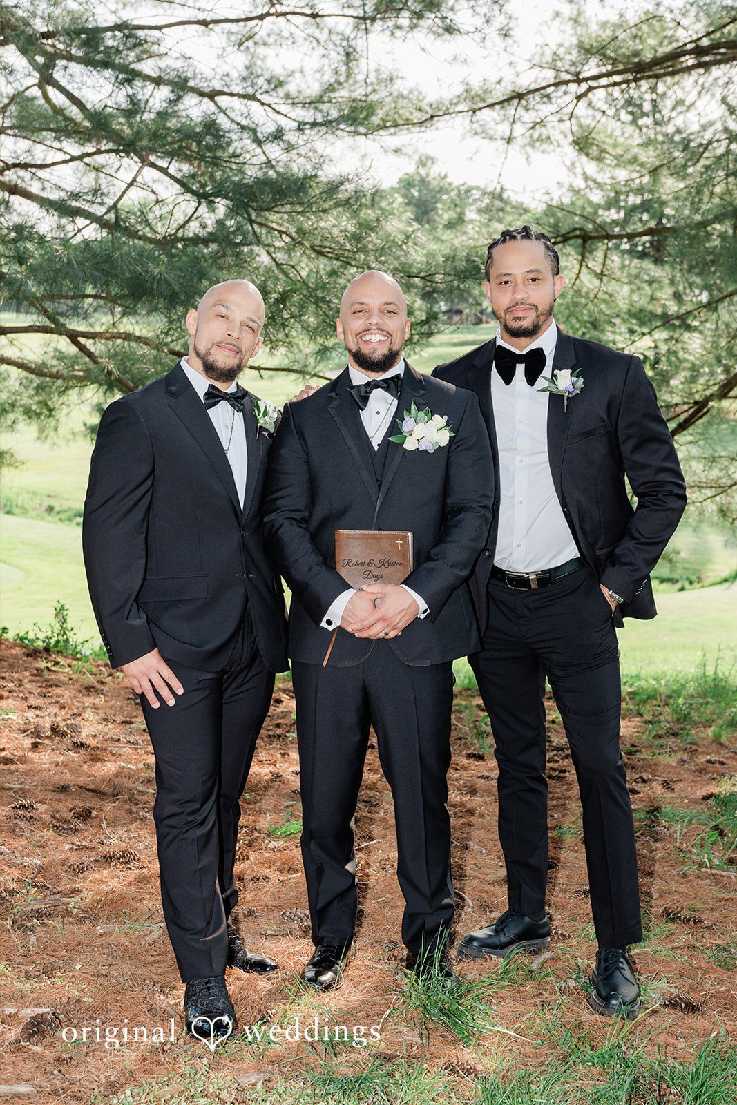 Kristen + Robert A portrait of the groom with his groomsmen