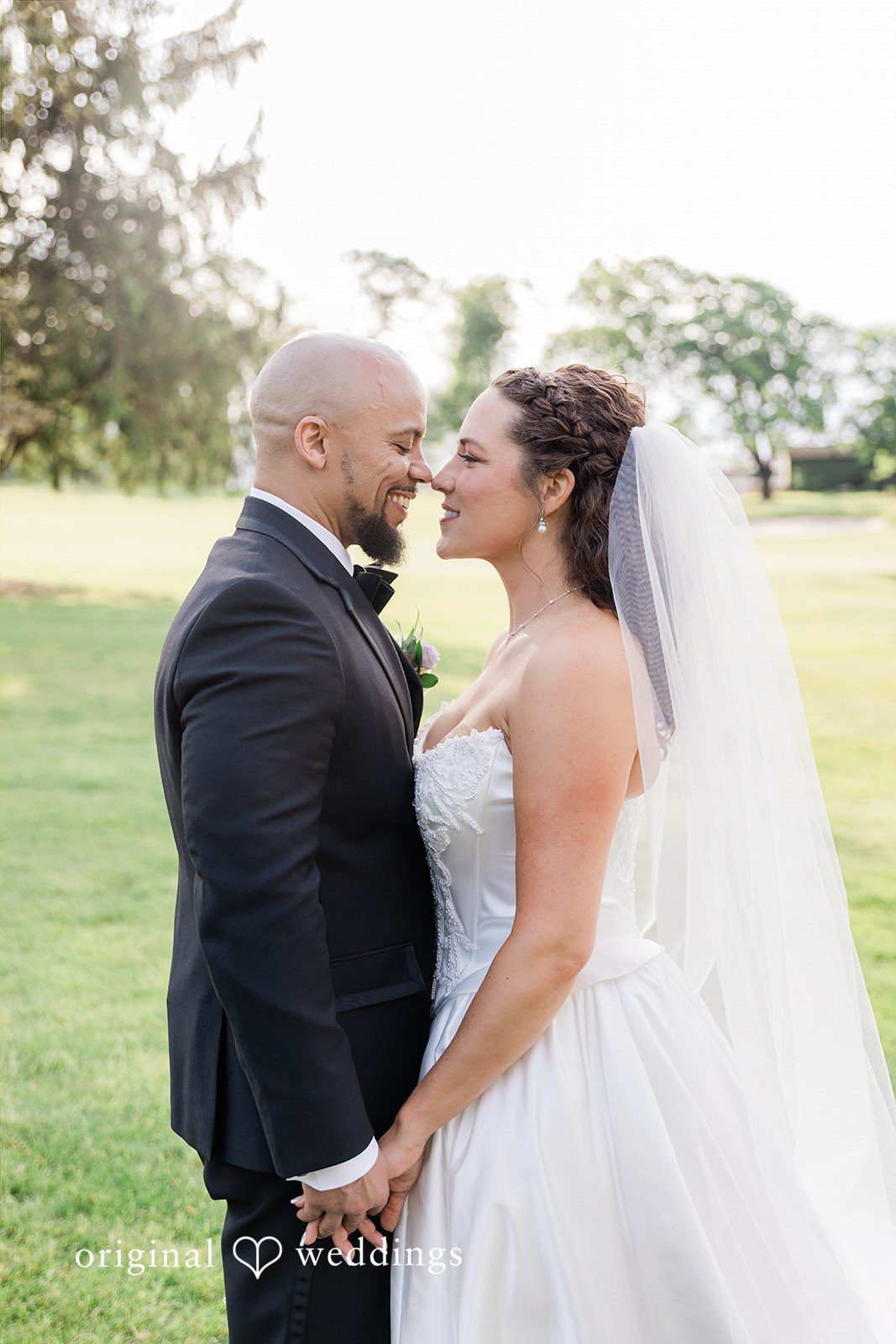 Kristen + Robert The couple shares a romantic moment at the Coatesville Country Club's outdoor space