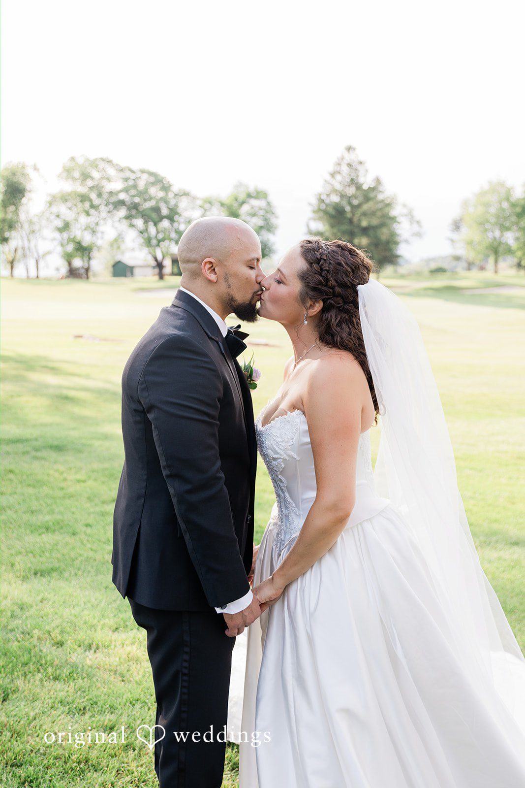 Kristen + Robert The couple takes a romantic kiss