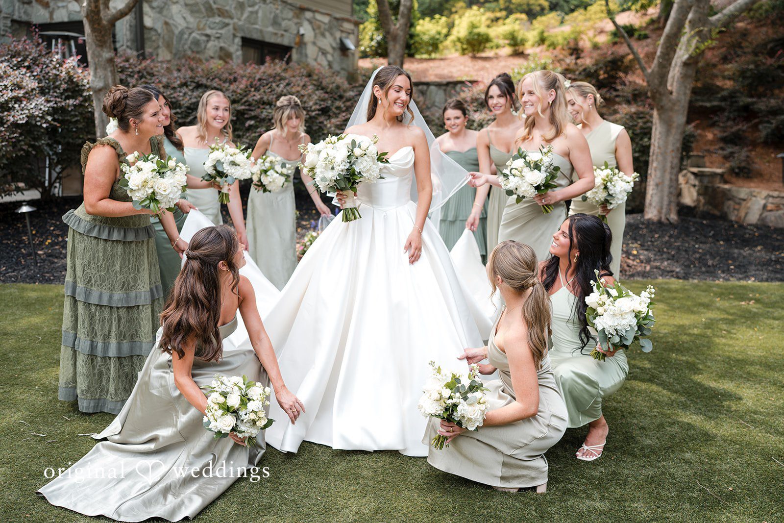 Megan + Grant Our Atlanta wedding photographers captured a beautiful portrait of the bride and her bridesmaids at the Country Club of the South