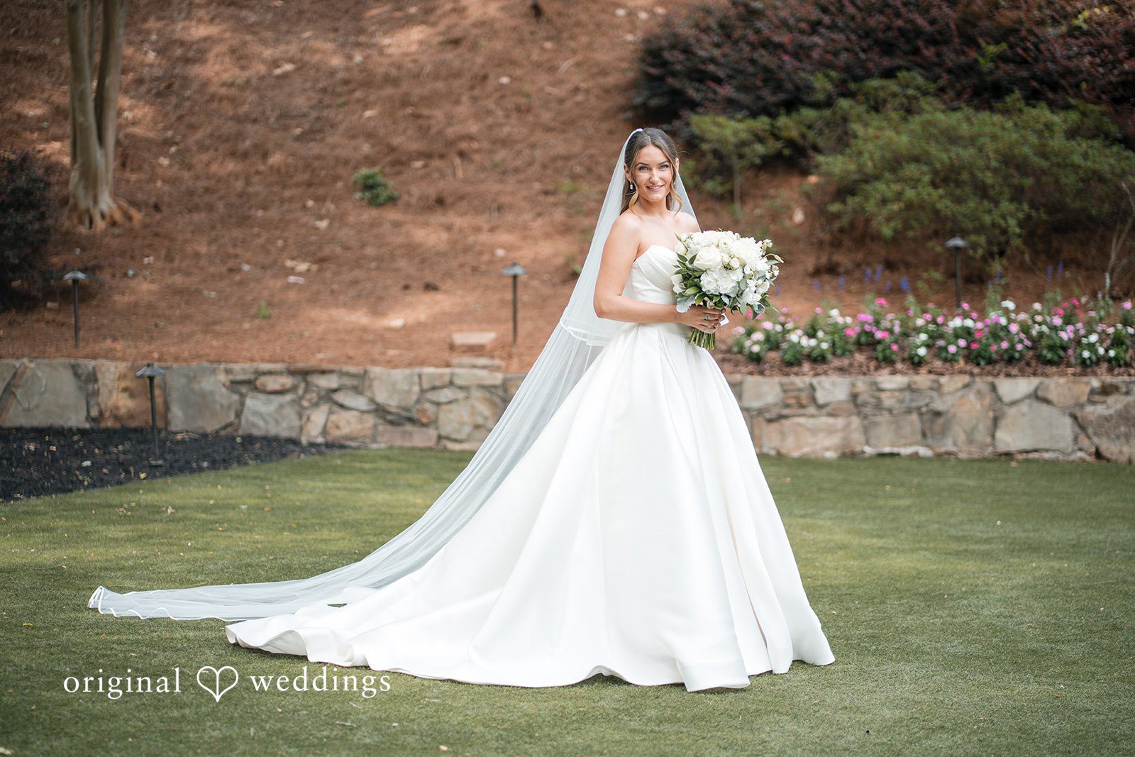 Megan + Grant A gorgeous portrait of the bride in the venue’s outdoor area