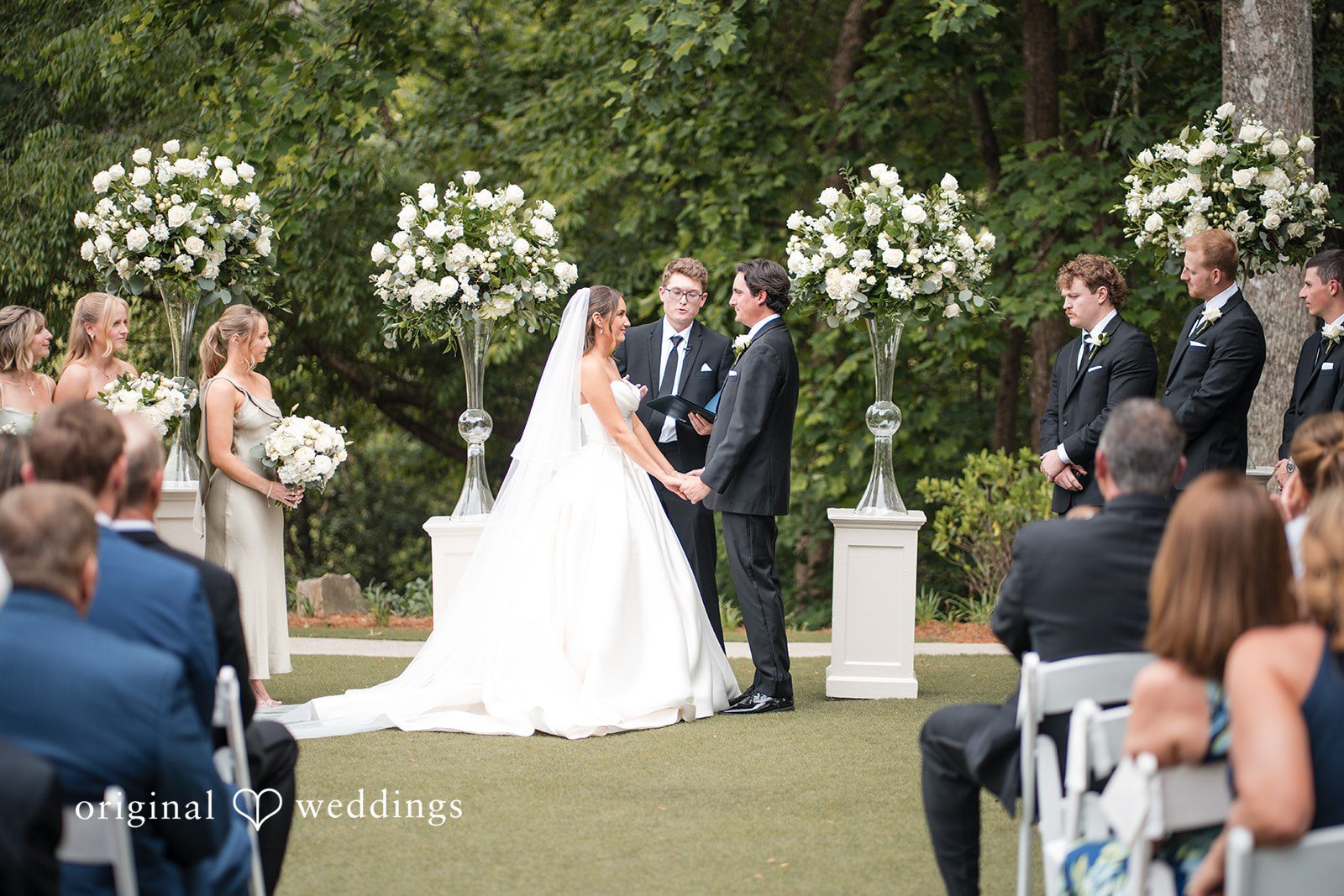 Megan + Grant The bride and groom exchange marital vows at Country Club of the South
