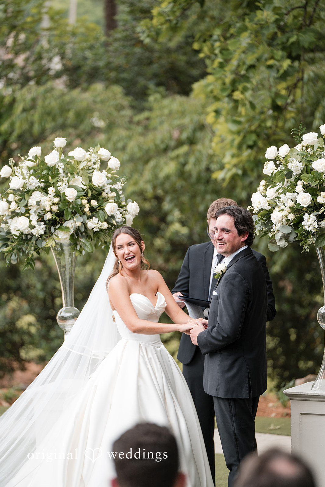Megan + Grant The couple shows great excitement as they exchange vows