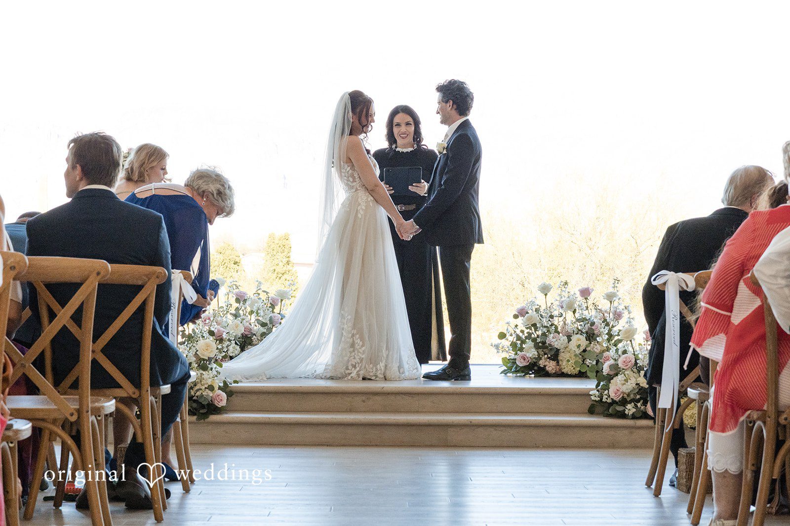Jared + Jessica Lovely couple exchanging vows during ceremony