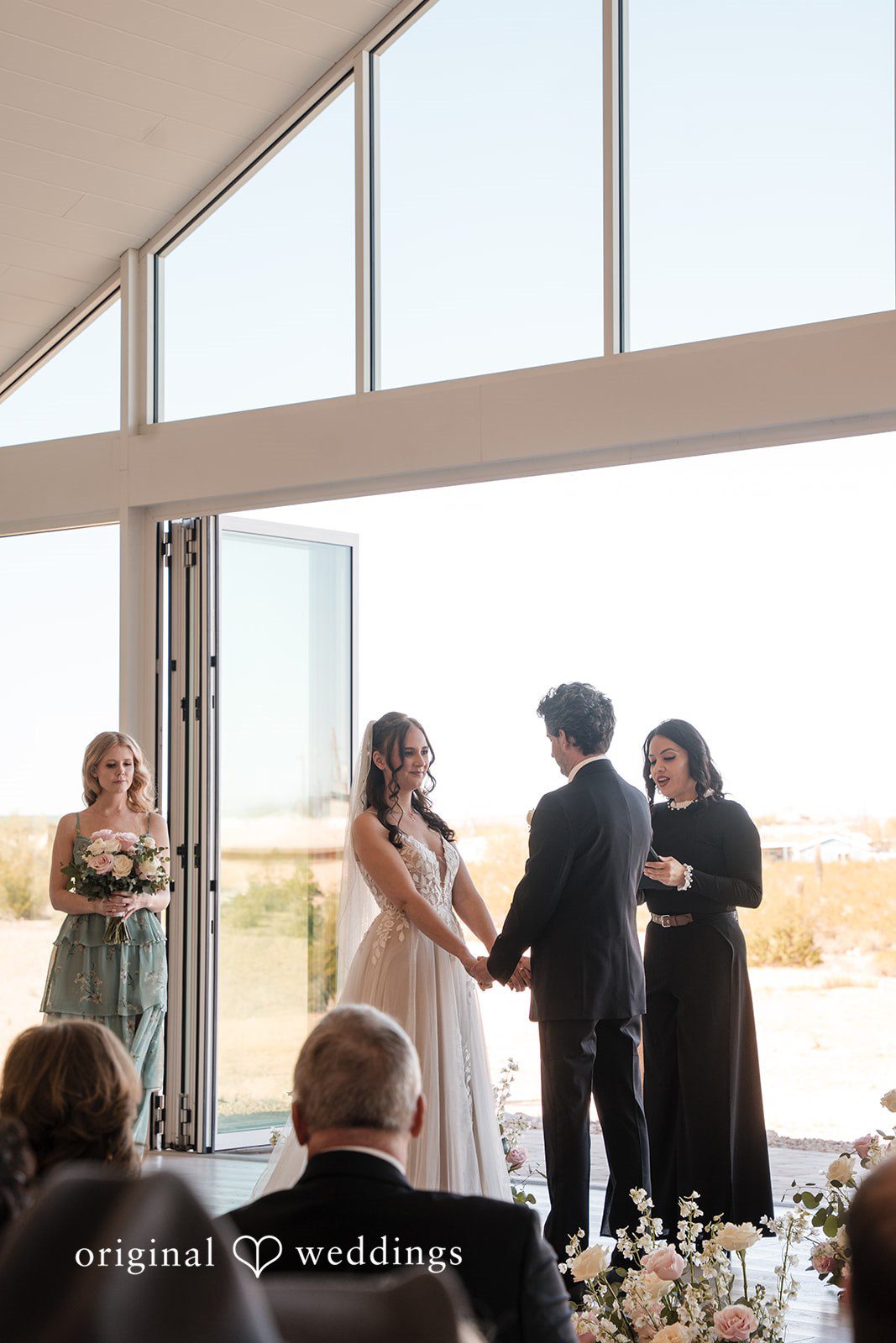 Jared + Jessica Lovely couple exchanging vows during ceremony