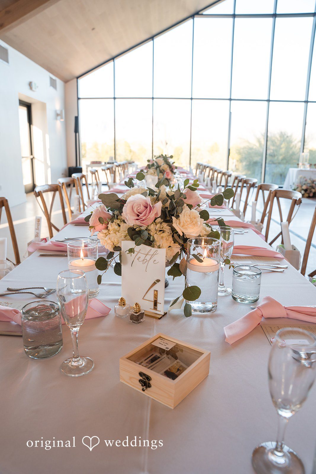 Jared + Jessica Wedding table decorated with flowers at Desert View Weddings & Events