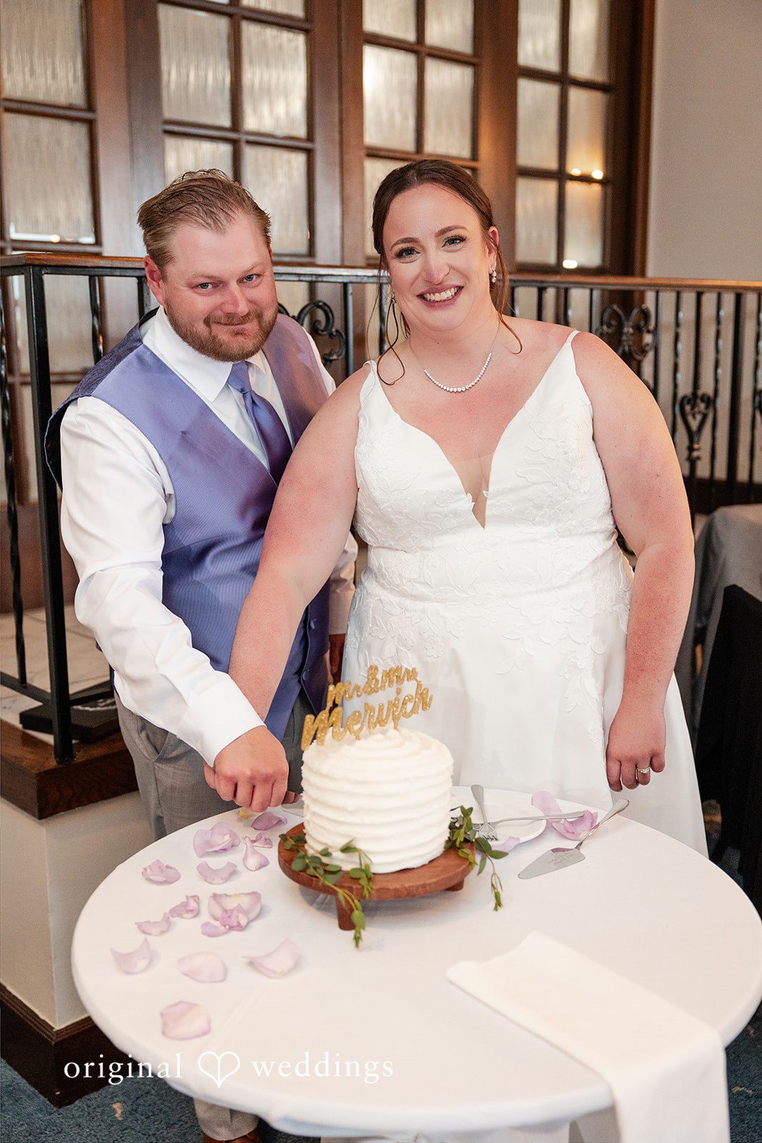 Katelyn + Bradley Bride and groom cutting their wedding cake during the reception