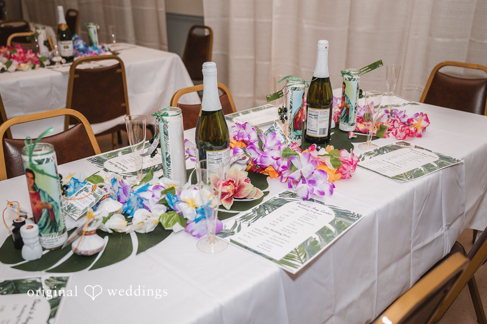 Decorated reception tables prepared for the wedding celebration