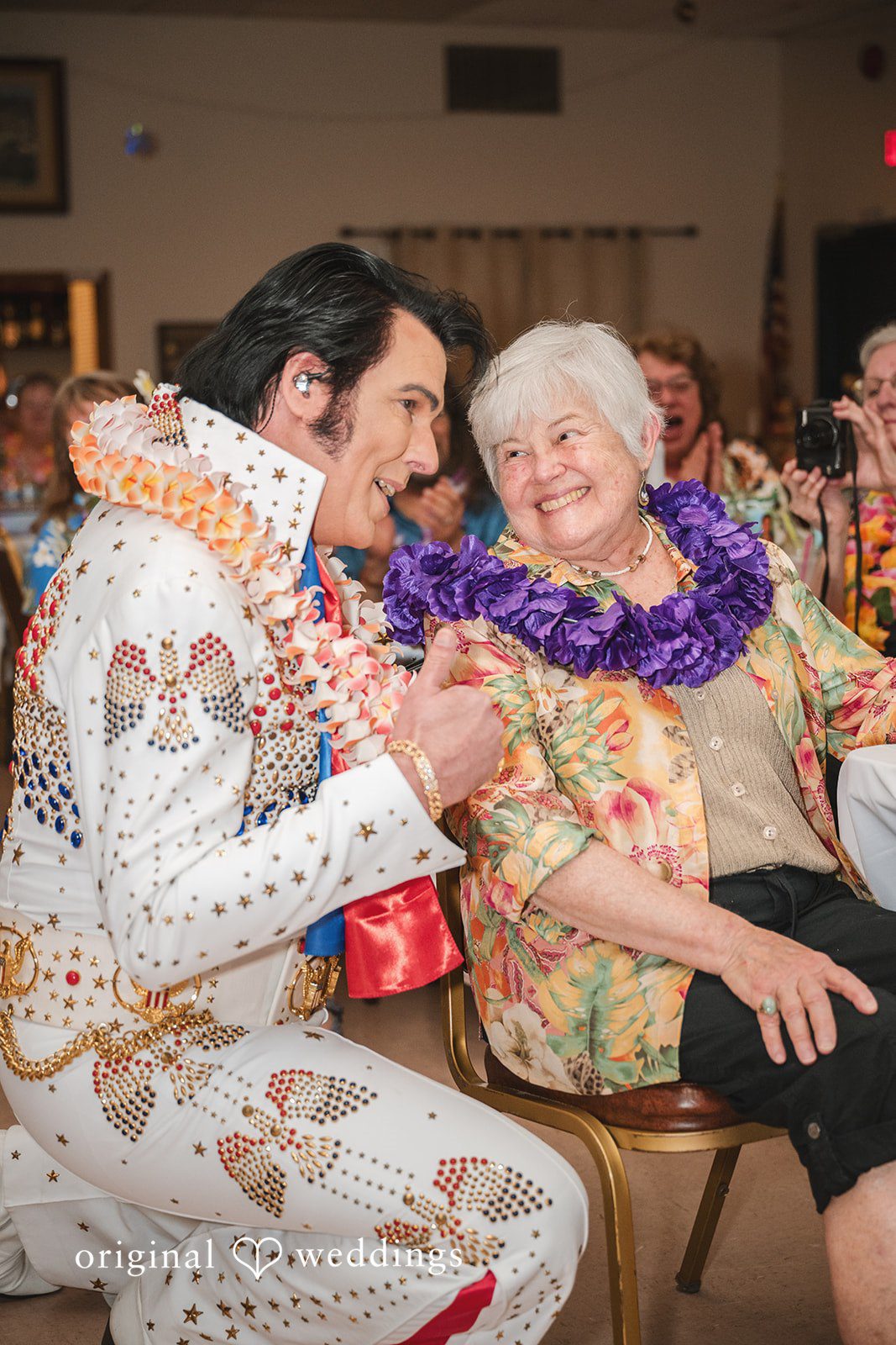 Ceremony officiant posing with a wedding guest