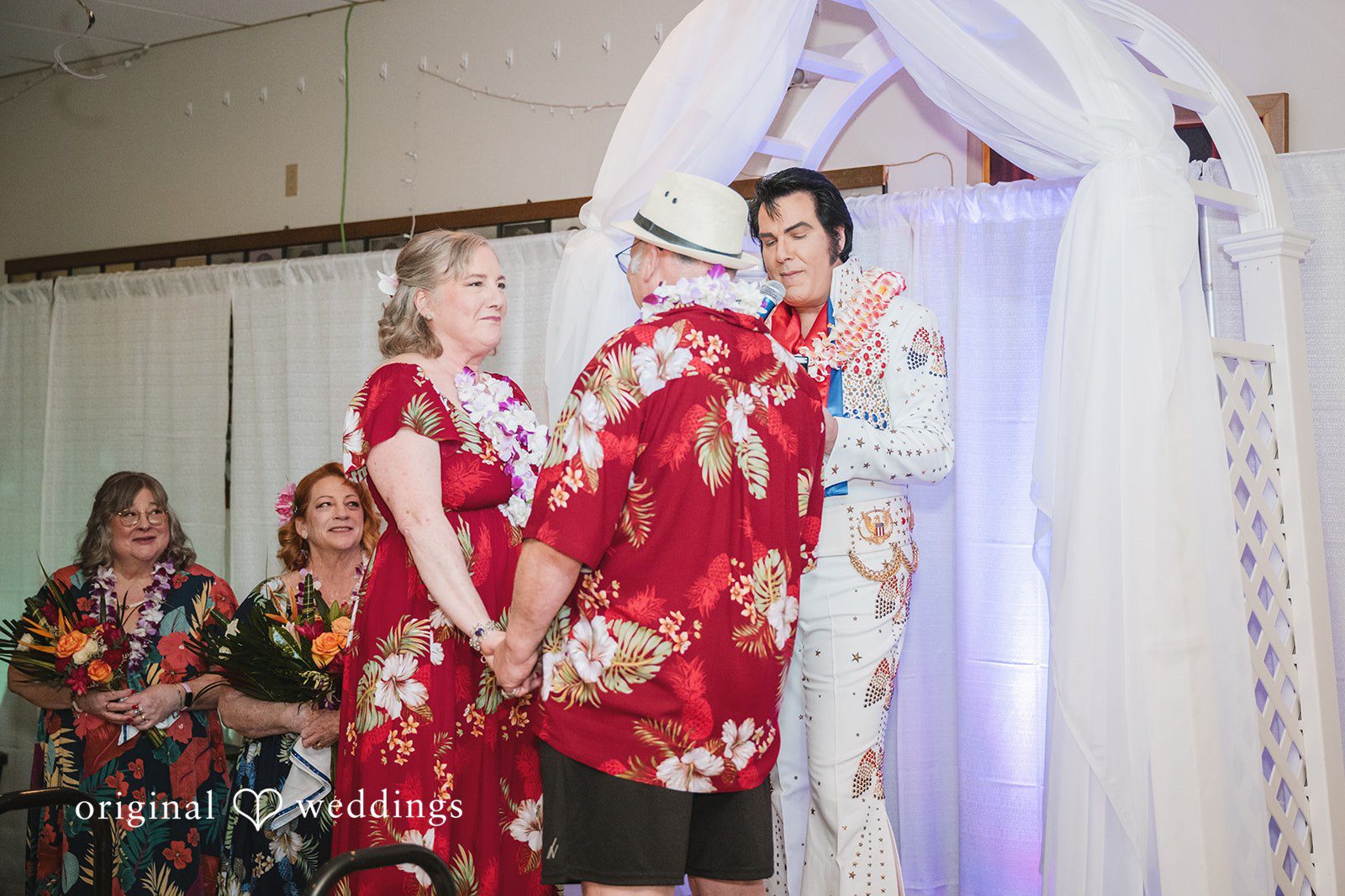 Couple listening during the wedding ceremony vows