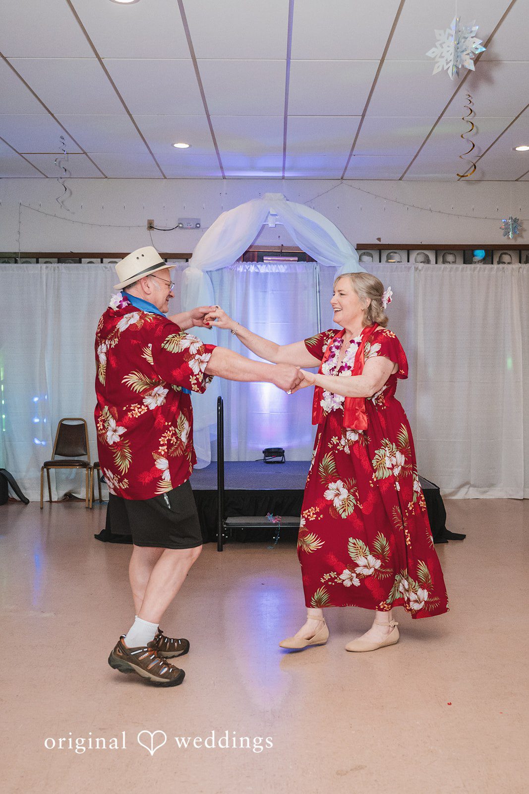 Bride and groom sharing their first dance at the reception