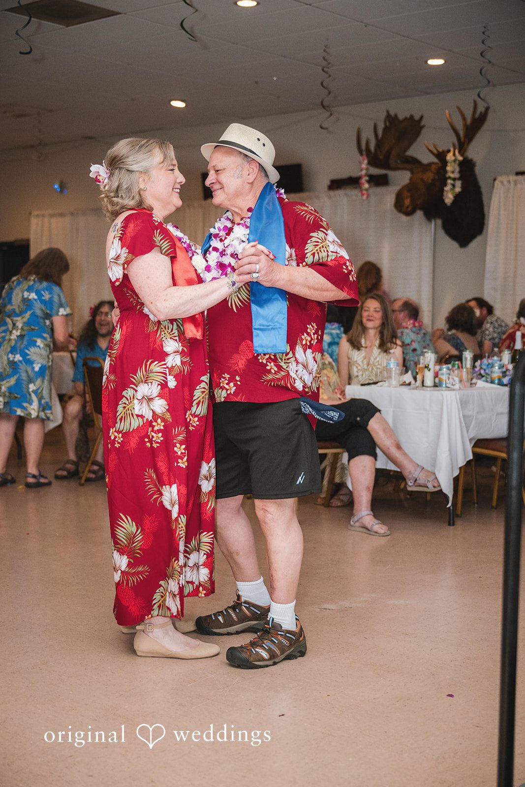 Bride and groom enjoying fun moments together at the reception