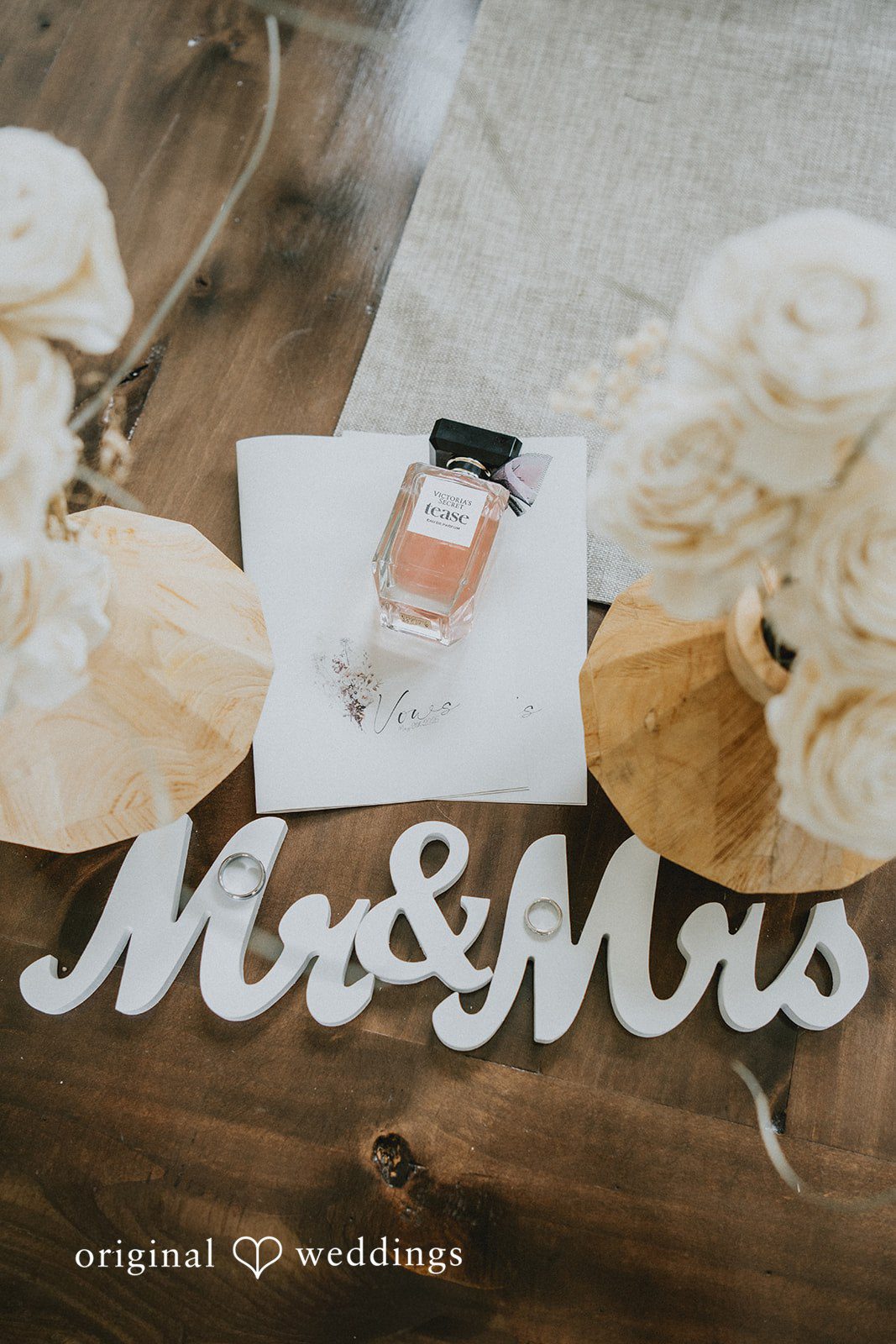 Sunny + Erika Wedding letters decorated with the couple’s rings