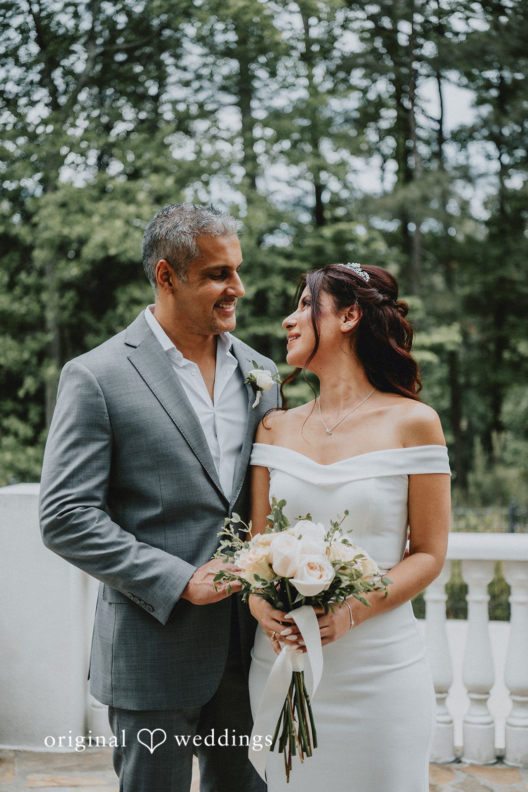 Sunny + Erika Bride and groom looking at each other outdoors