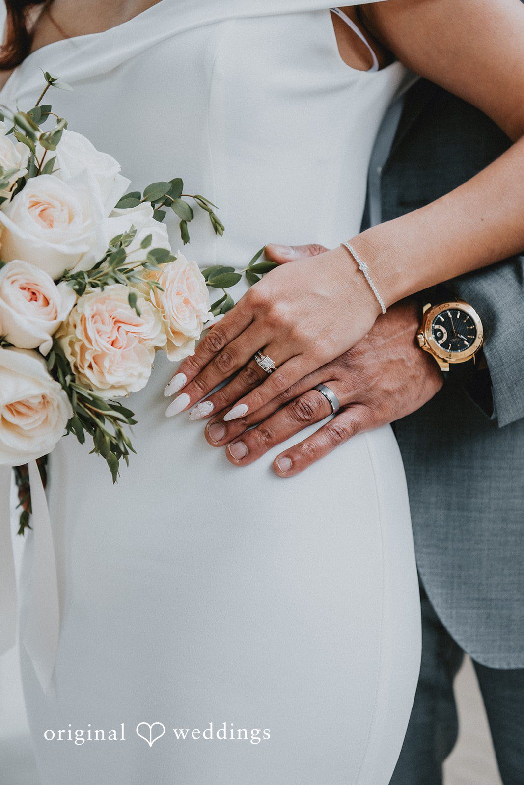 Sunny + Erika Close-up of the couple’s wedding rings