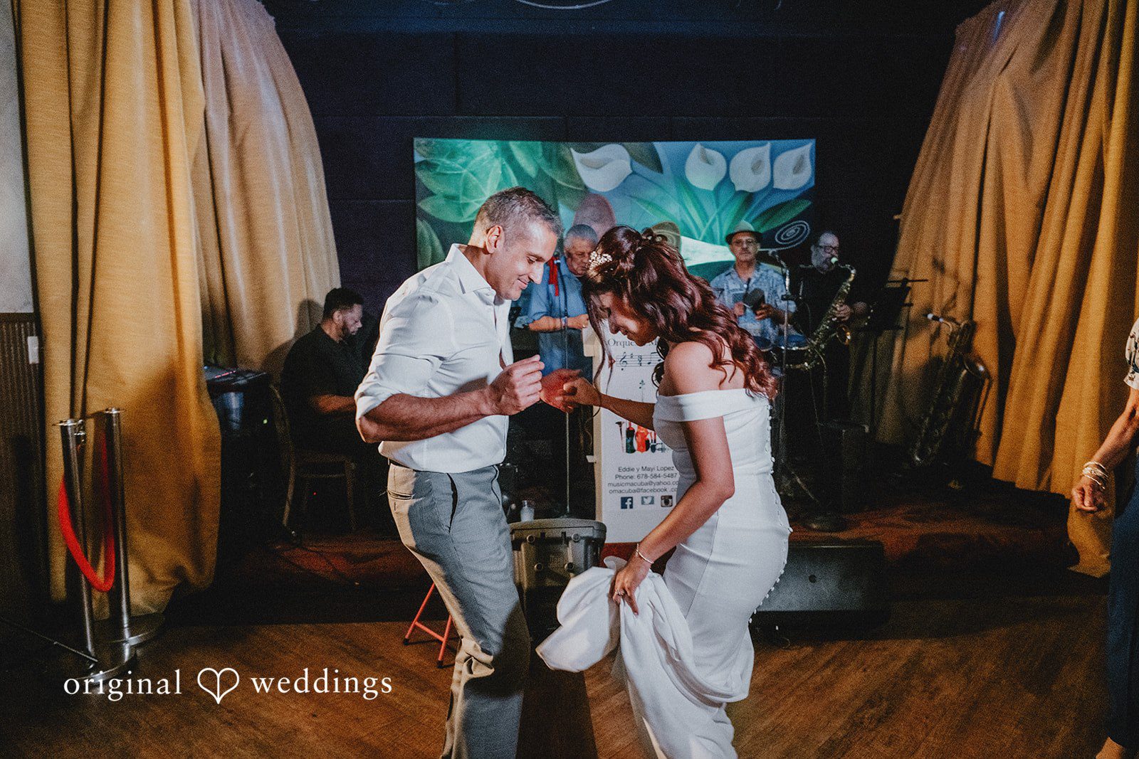 Sunny + Erika Bride and groom celebrating during the reception