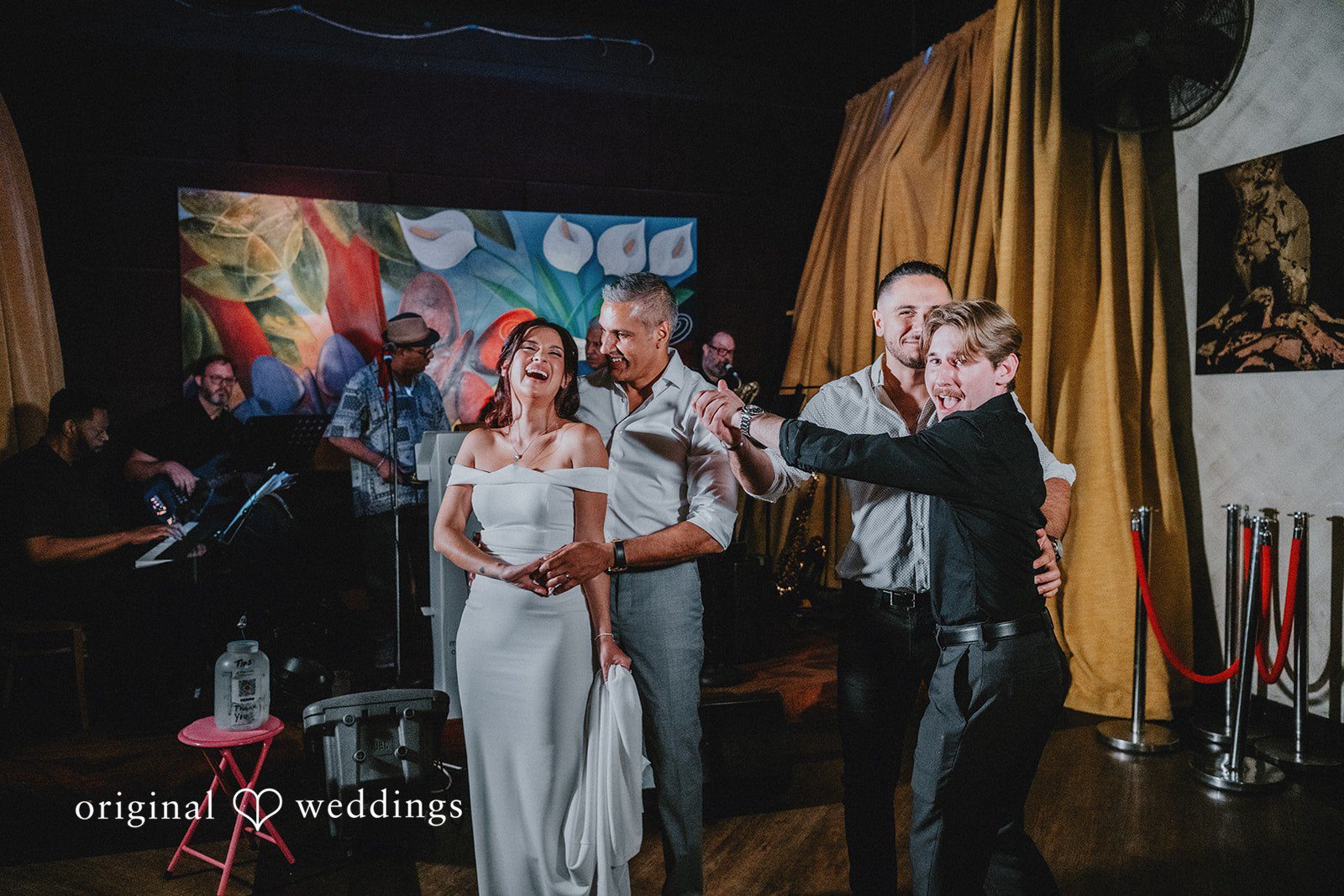 Sunny + Erika Bride and groom celebrating with wedding guests