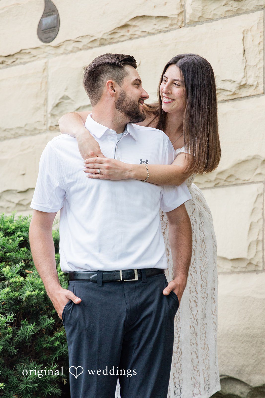 Morgan + Griffin Romantic standing pose with couple smiling at each other