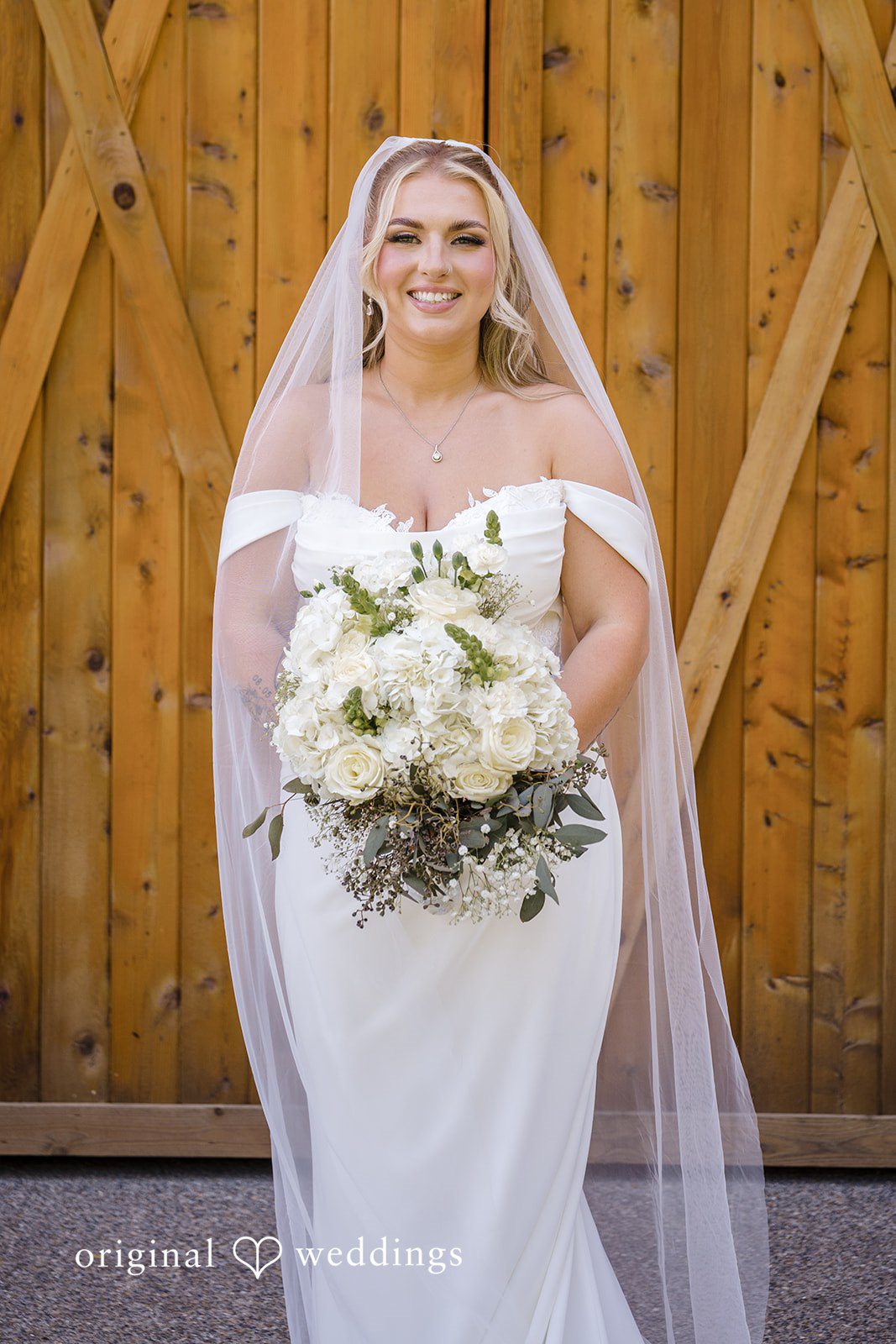 Full-length bridal portrait after getting ready