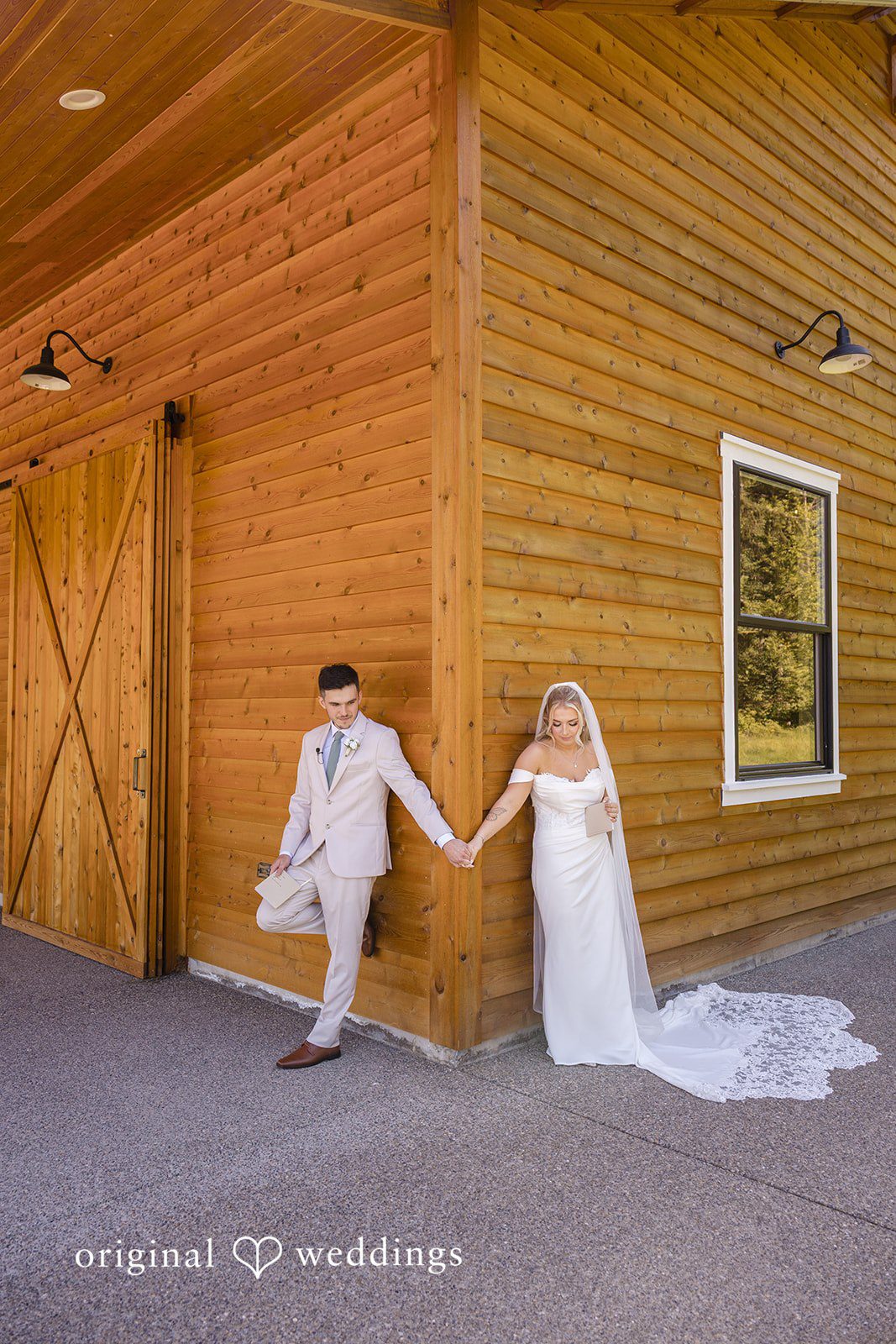 Bride and groom holding hands during the ceremony