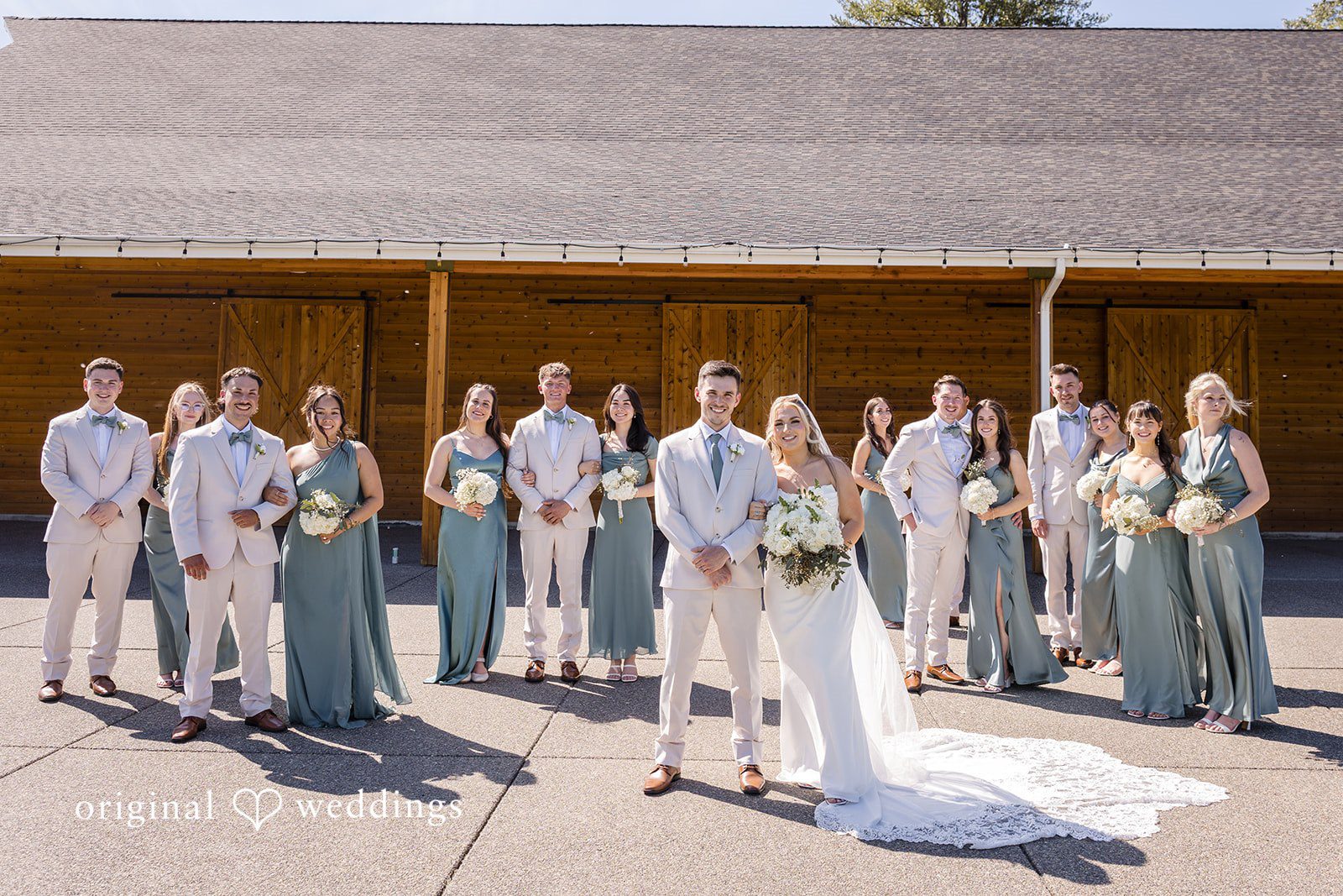 Bride, groom, bridesmaids, and groomsmen group portrait