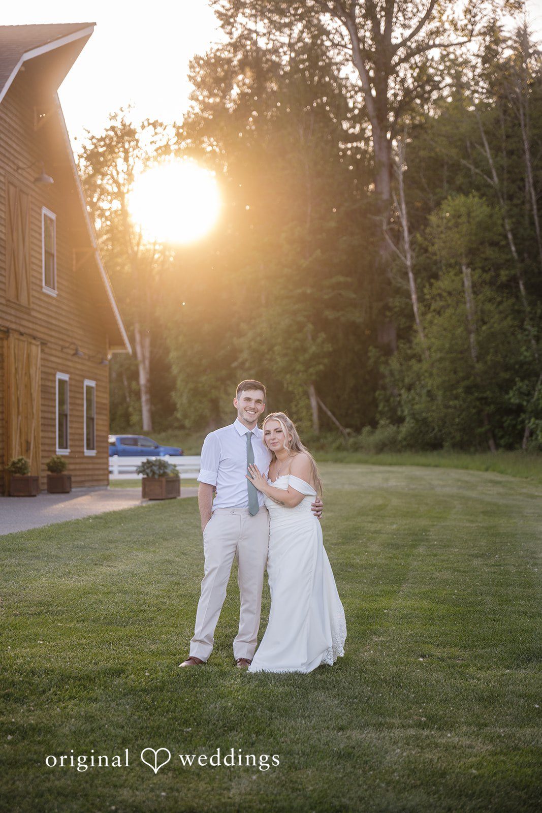 Bride and groom embracing during a sunset portrait