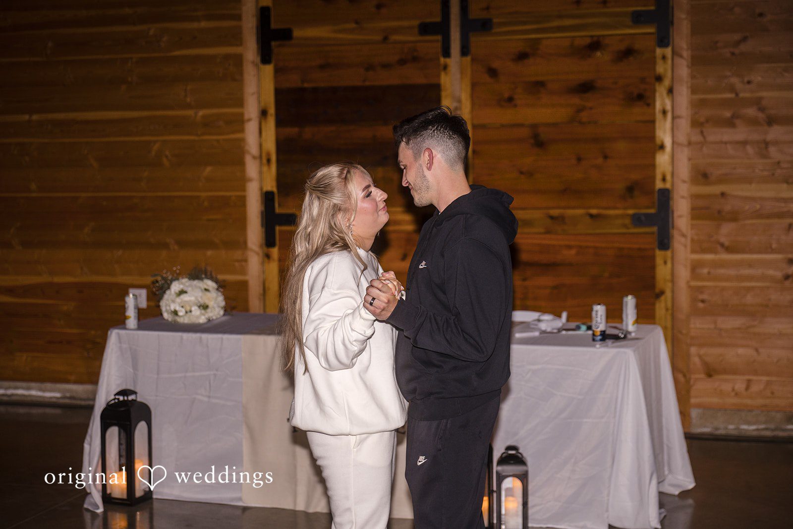 Bride and groom dancing together at the reception