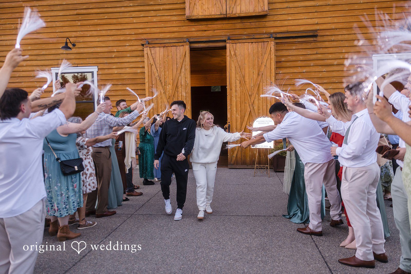 Newlyweds leaving the reception celebration