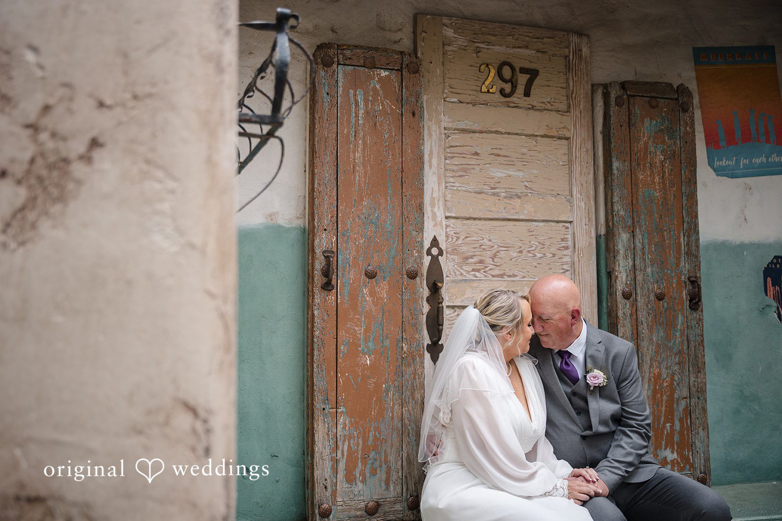 Lorene + Brad Bride and groom sitting together during portraits