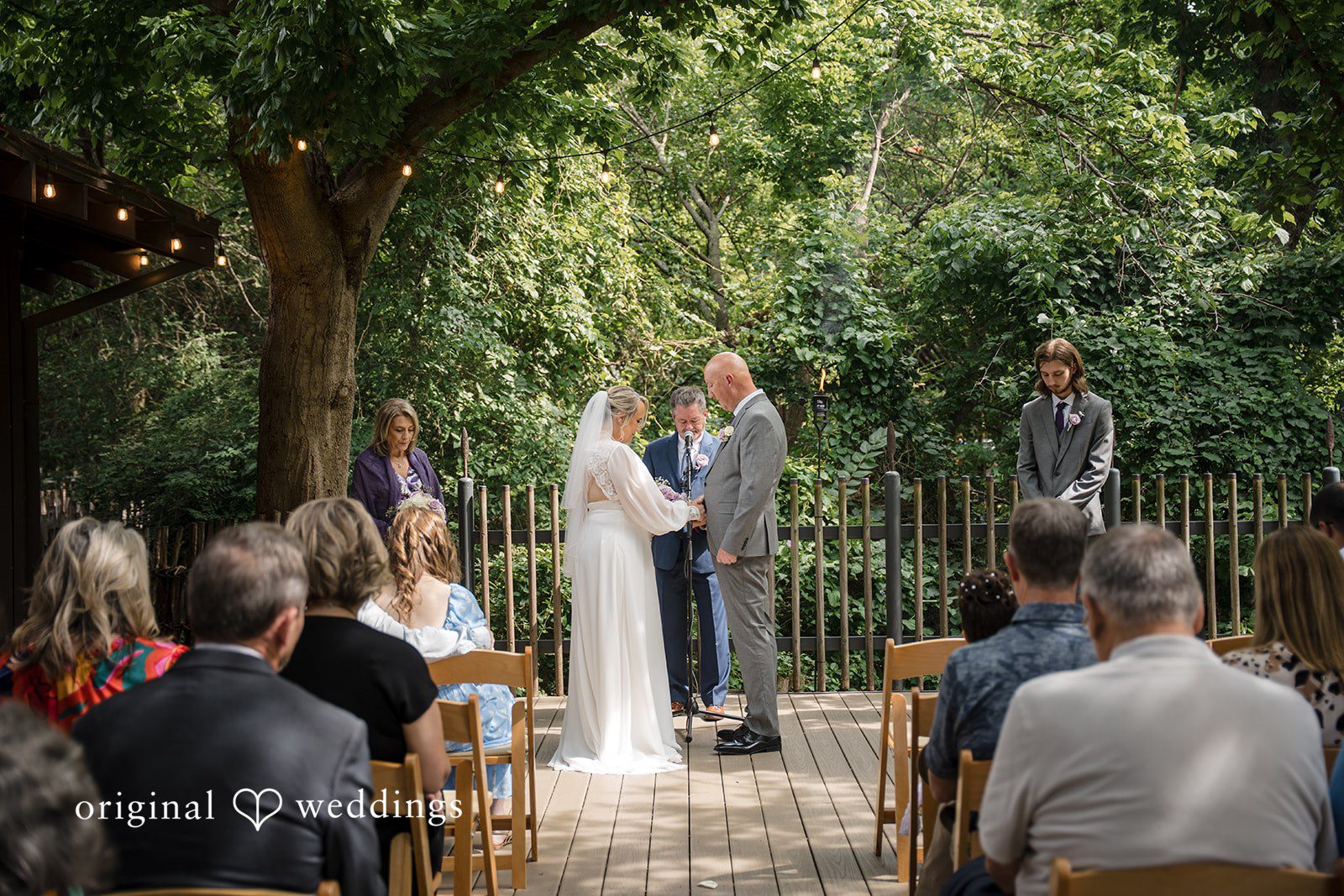 Lorene + Brad Wide ceremony view during the wedding vows