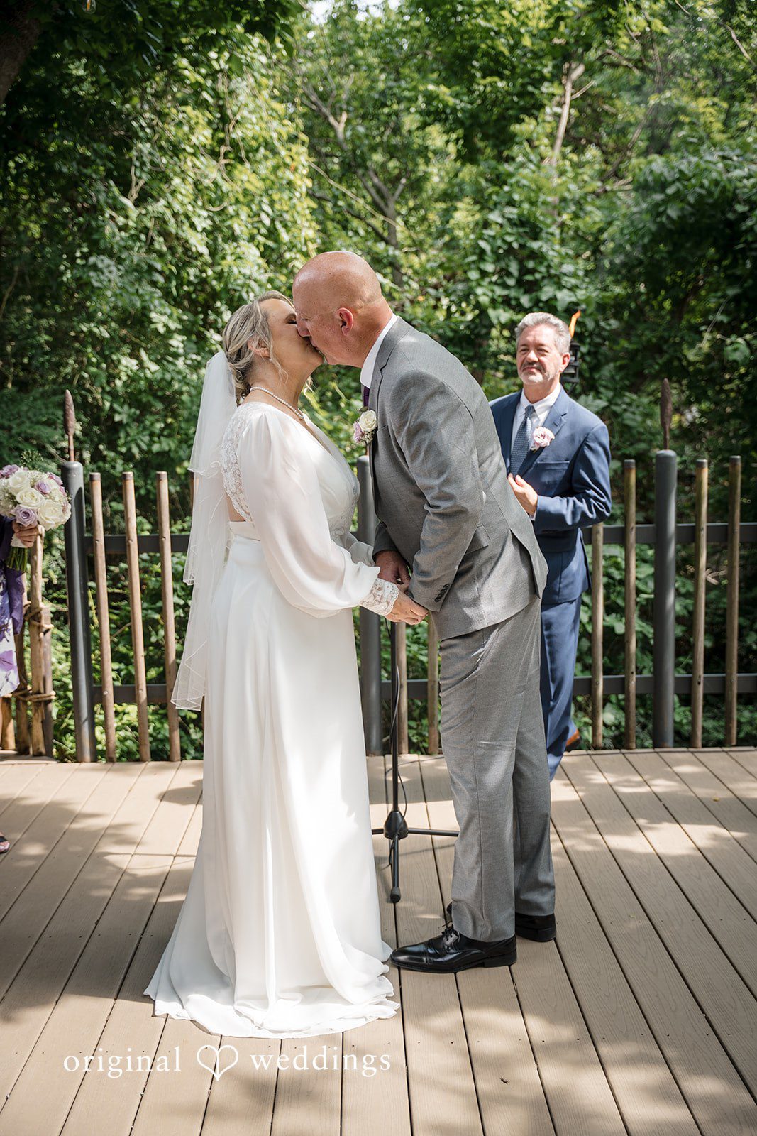 Lorene + Brad First kiss after the wedding ceremony