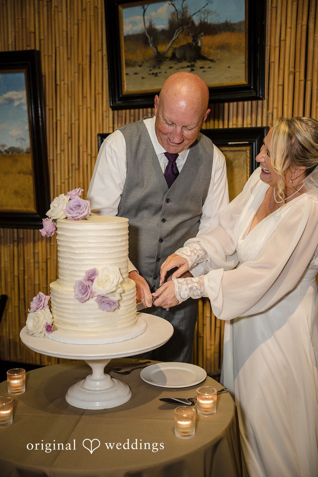 Lorene + Brad Bride and groom cutting their wedding cake