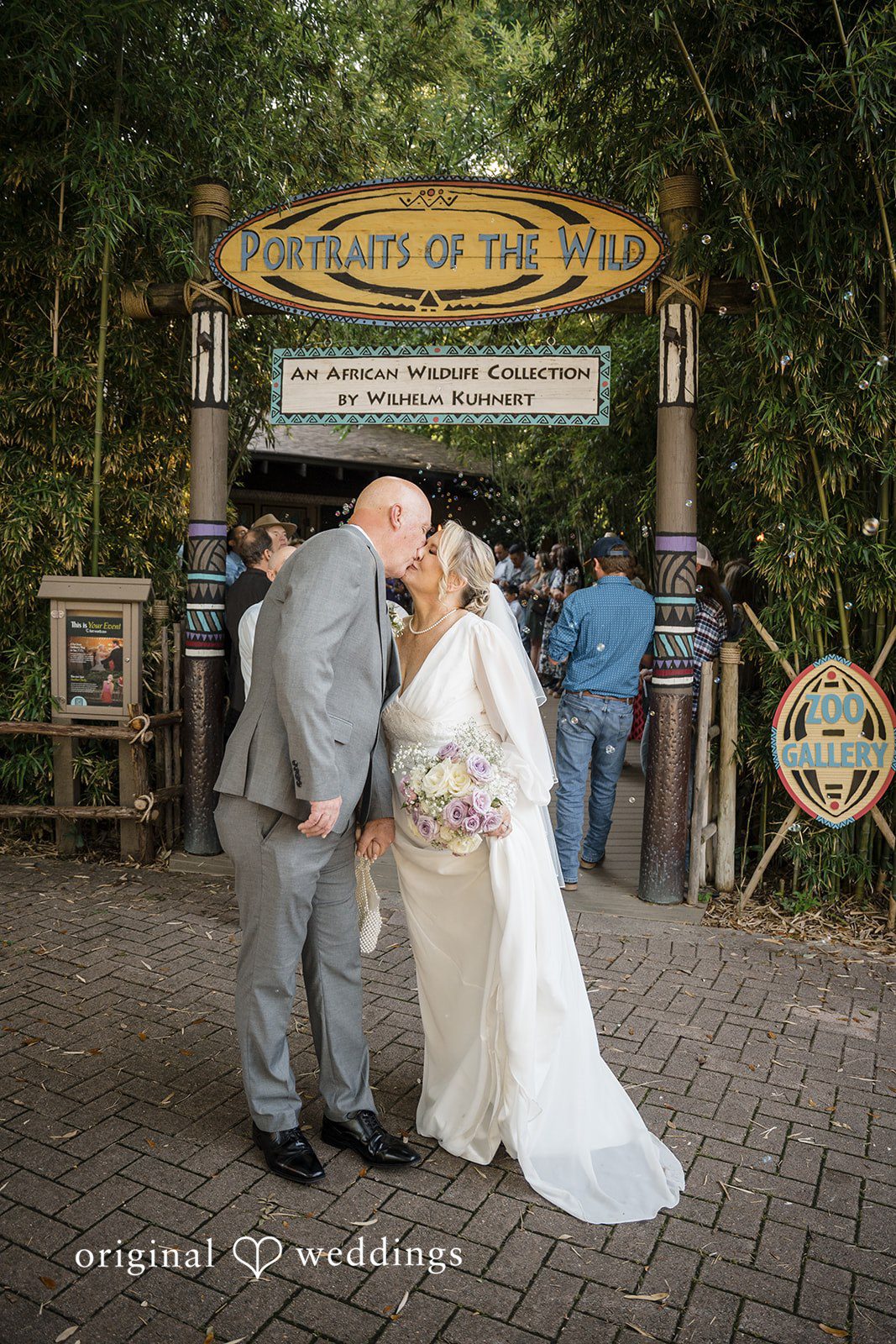 Lorene + Brad Bride and groom kissing outside the venue