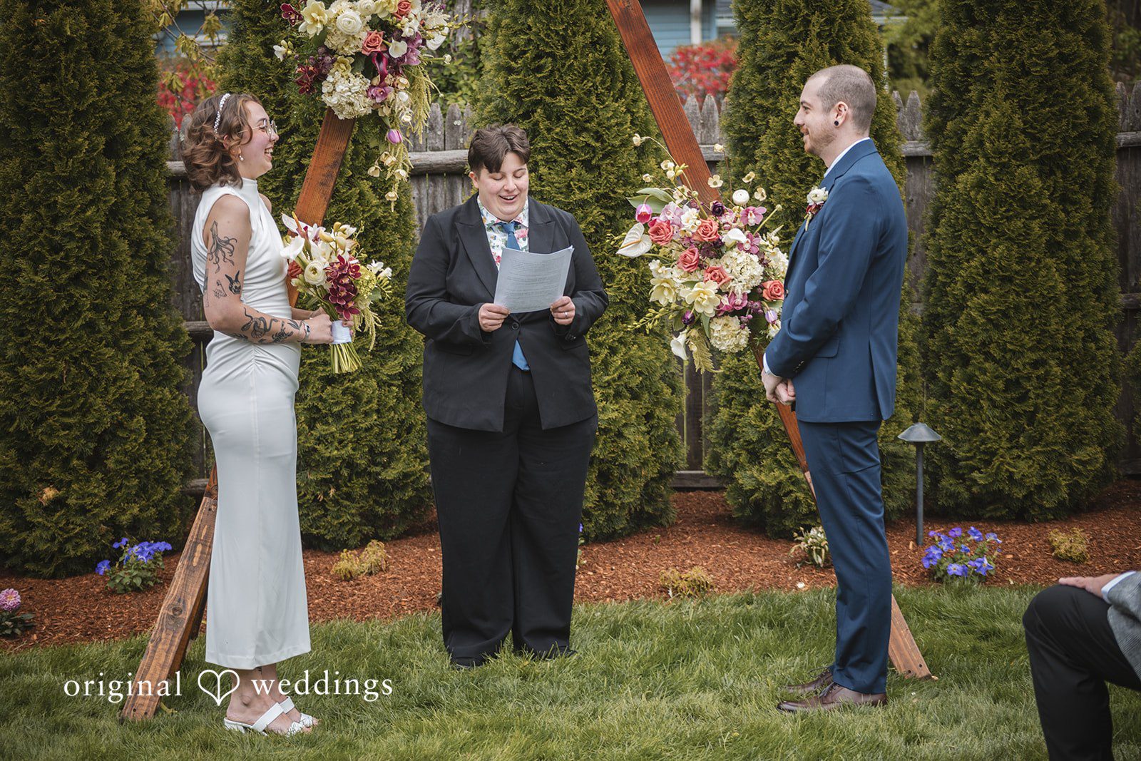 Matthew + Katie Bride and groom reading vows to each other during the ceremony