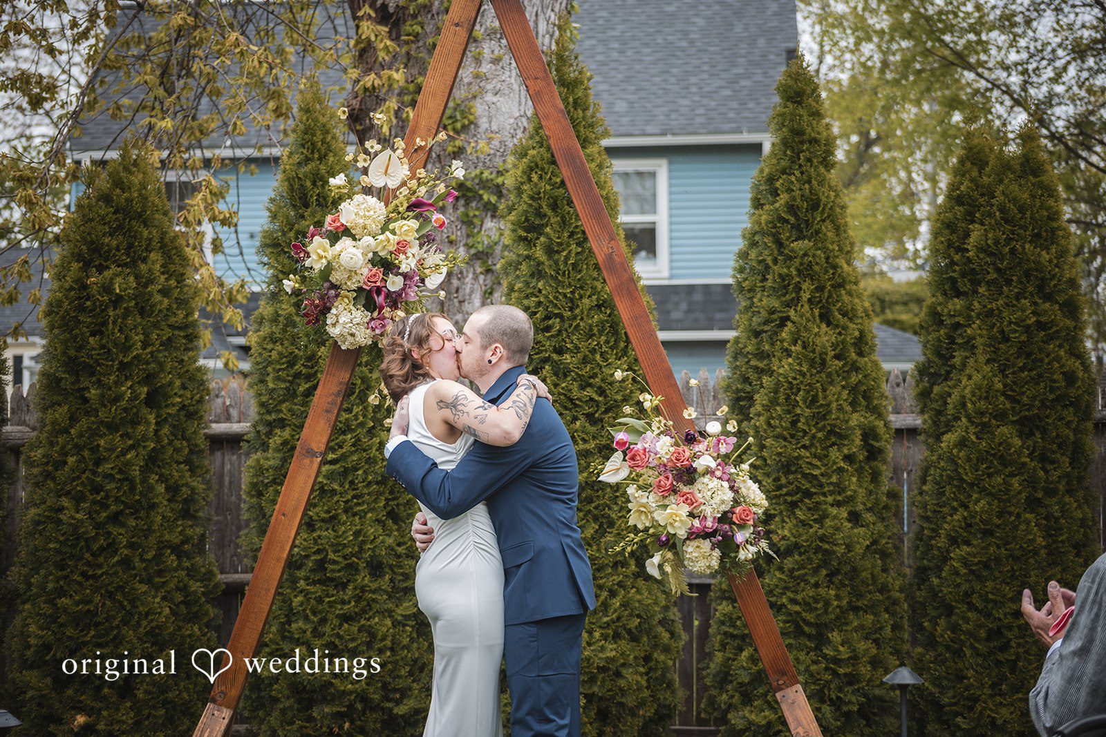Matthew + Katie Bride and groom sharing their first embrace after exchanging vows