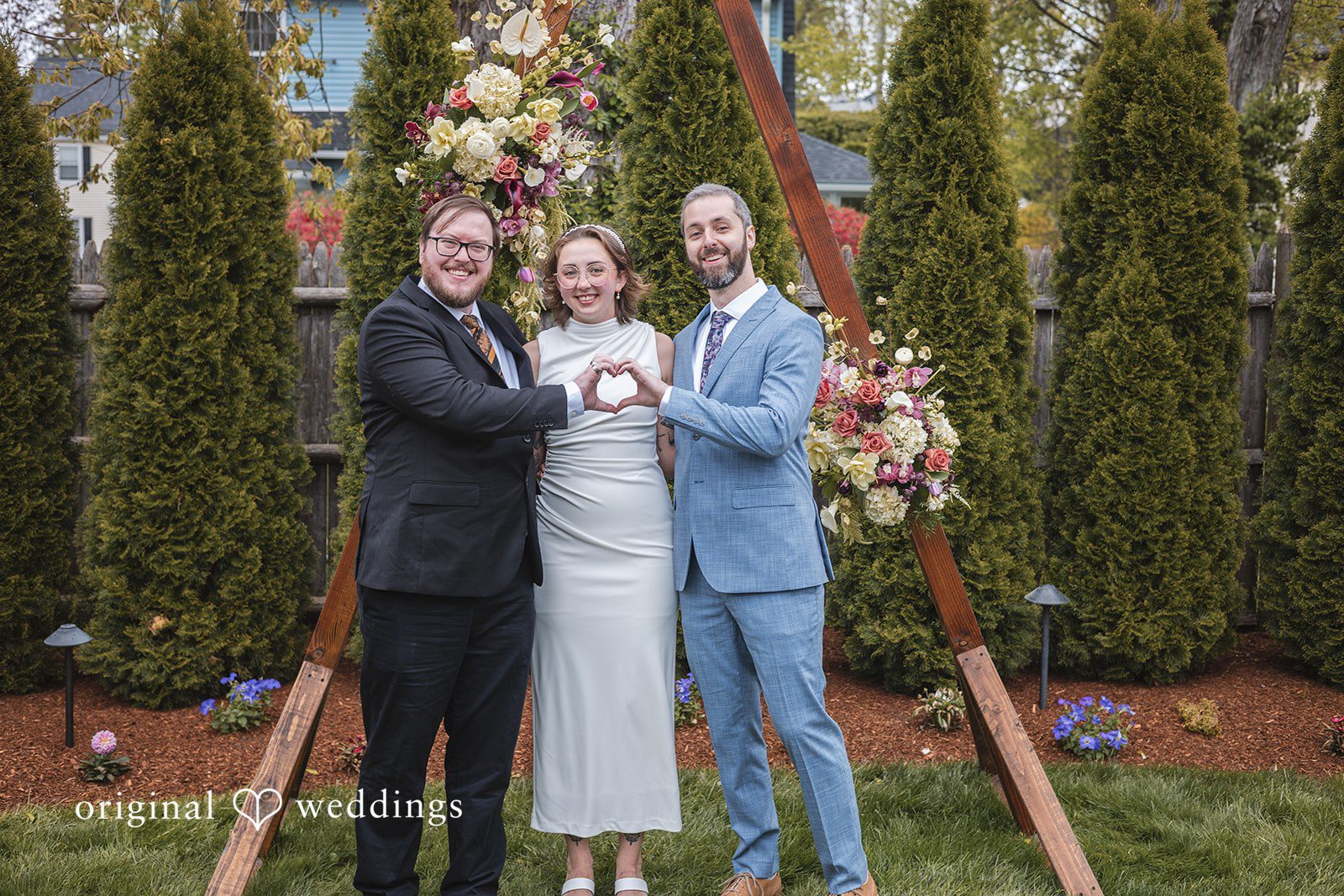 Matthew + Katie Bride celebrating with friends during wedding portraits