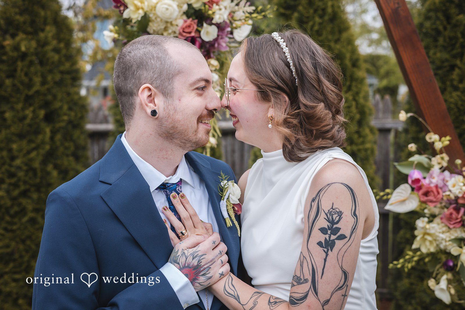 Matthew + Katie Bride and groom standing close together during romantic portraits