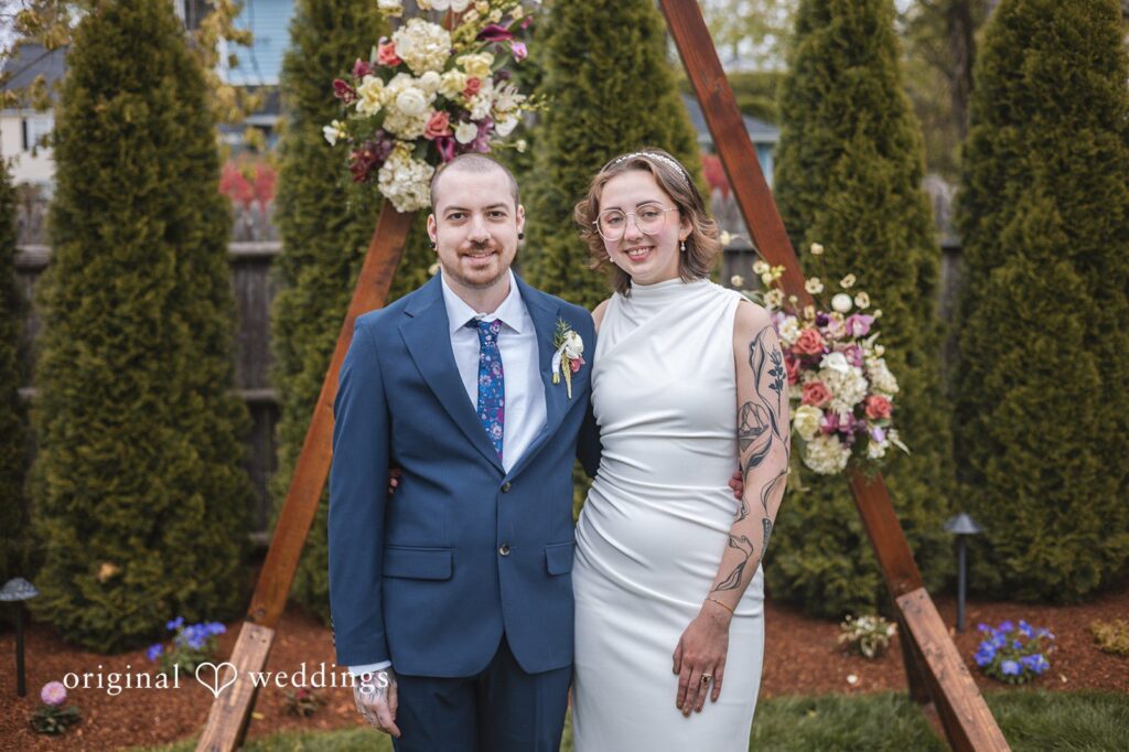 Matthew + Katie Full-length outdoor portrait of the bride and groom in the garden setting