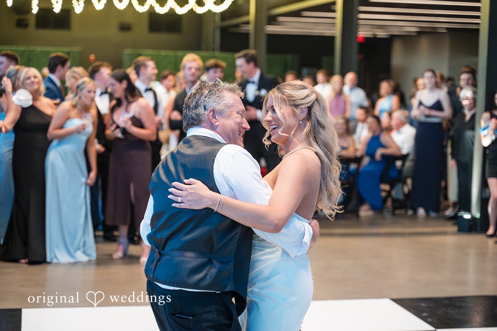 Bride sharing a dance with a man