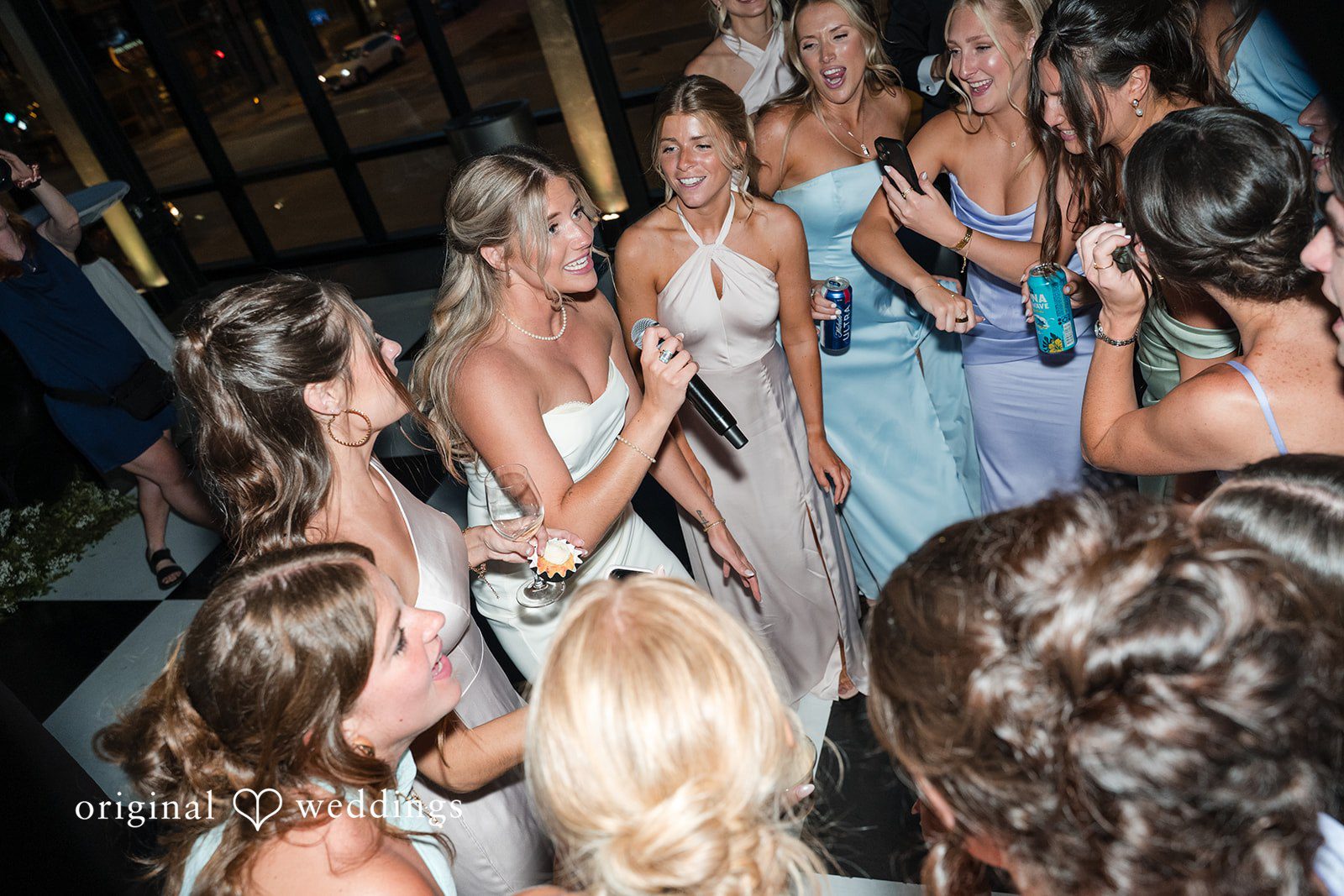 Lovely bride sharing  a fun moment with the friends and family